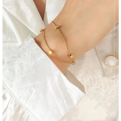 Double Layer Gold Toned Snake Chain bracelet With Cubic Beads