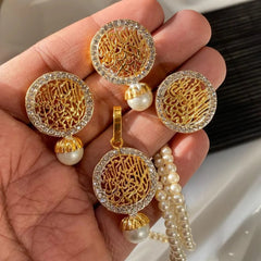 Kalma E Tayyaba pendant set with earrings and a pearl chain