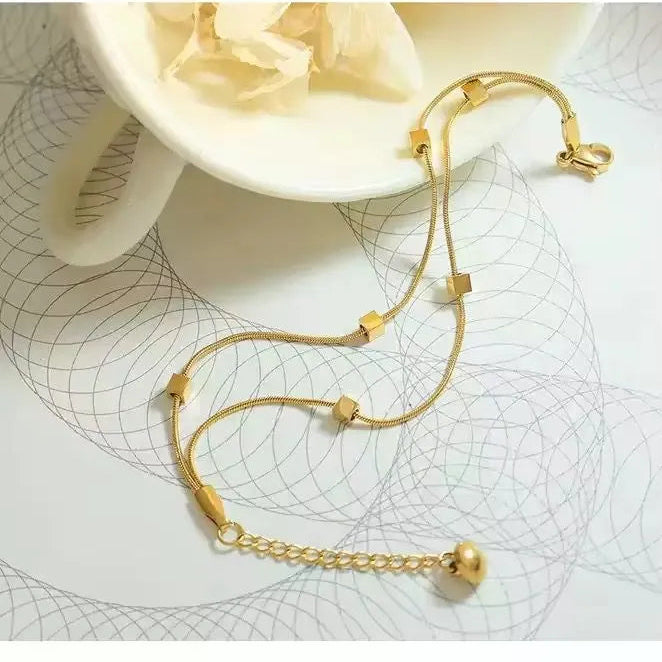 Double Layer Gold Toned Snake Chain bracelet With Cubic Beads