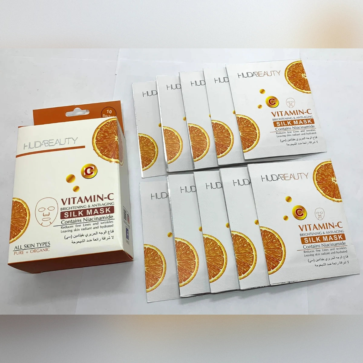 Huda Beauty Vitamin C Silk Mask – Brightening & Anti-Aging Glow